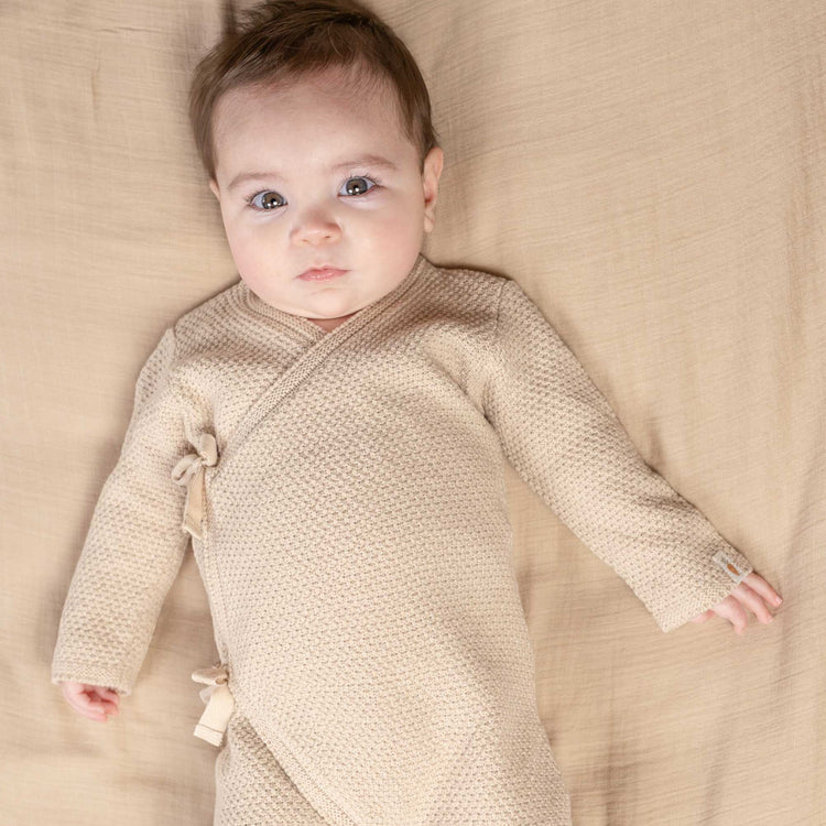 LITTLE DUTCH. Knitted one-piece wrap suit Sand - 68